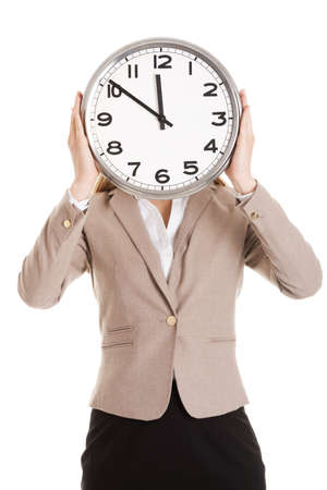 Beautiful caucasian business woman with clock on face. Isolated on white.の写真素材
