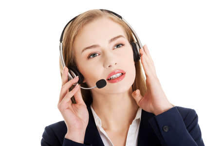 Beautiful caucasian business woman at call center.の写真素材