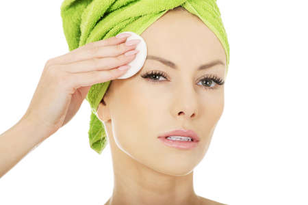 Beautiful woman with cotton pad.の写真素材