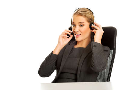 Call center woman sitting at the deskの写真素材