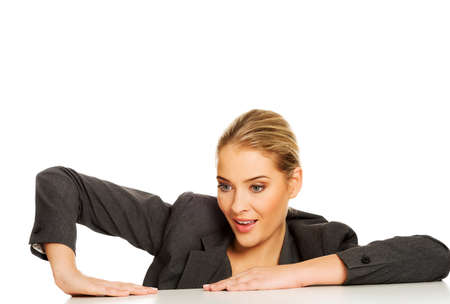 Businesswoman under the desk and based on itの写真素材