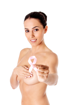 Topless woman with pink breast cancer ribbon.の写真素材