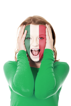 Woman with Mexico flag on face.の写真素材