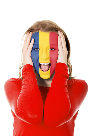 Woman with Romania flag on face.の写真素材