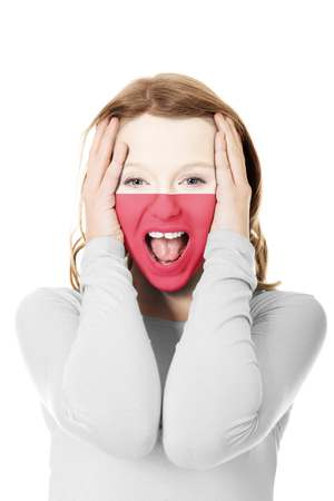 Woman with Polish flag on face.の写真素材