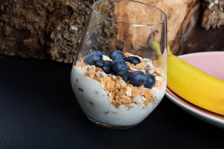 Dietetic breakfast - fruits yoghurt and muesli.の写真素材