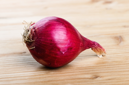 Fresh raw aromatic red onion.の写真素材
