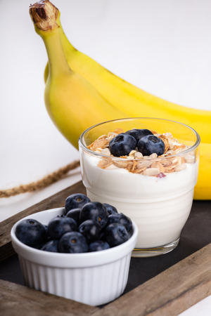 Dietetic breakfast - fruits yoghurt and muesli.の写真素材
