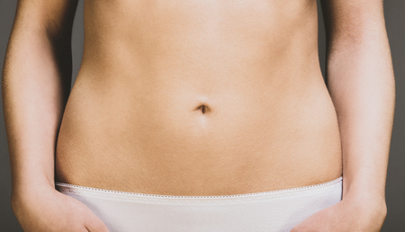 Womans belly in close viewの写真素材