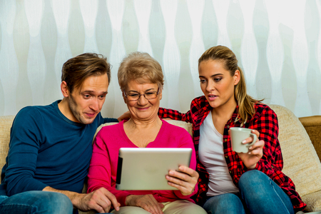 Family using tabletの写真素材