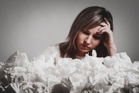 Woman covered with tissuesの写真素材