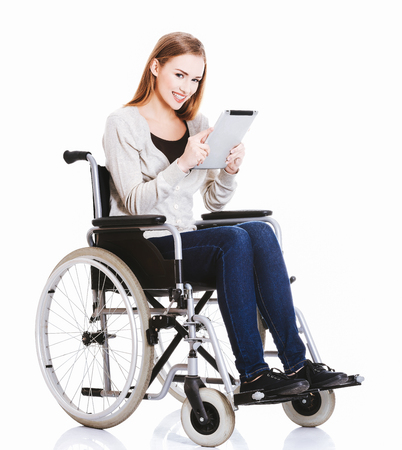 Disabled woman with tabletの写真素材