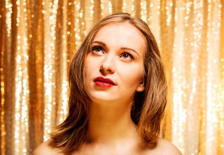 Elegant woman, golden luxuryの写真素材