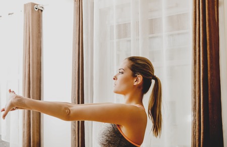 Woman training in homeの写真素材