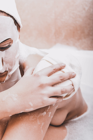 Washing and relaxing in bathの写真素材