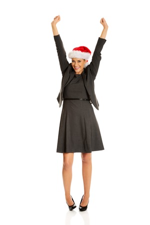 Businesswoman in christmas hatの写真素材