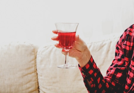Relax with glass of wineの写真素材