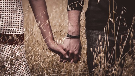 Lovers holding handsの写真素材