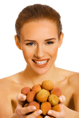 Woman with lychee fruitsの写真素材