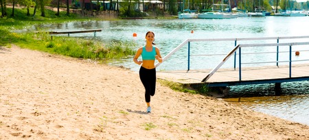 Sporty woman runningの写真素材
