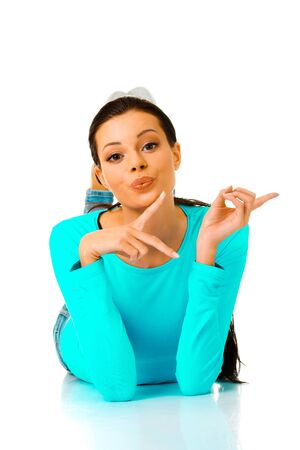 Woman showing direct with fingerの写真素材
