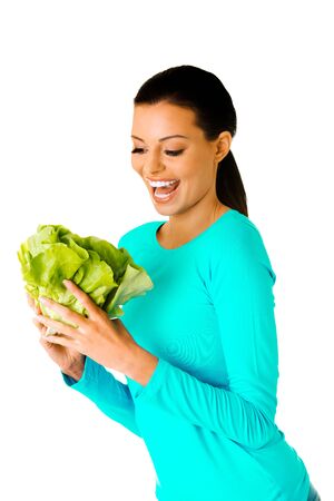Woman with green lettuceの写真素材