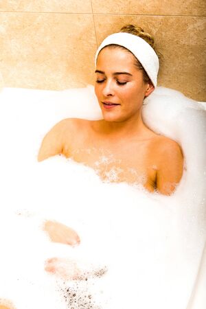 Bathing woman pampering bodyの写真素材