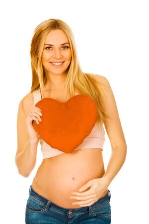 Pregnant woman with heartの写真素材