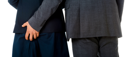 Man putting hand on woman bottom. Harasment and molestation in workplace.の写真素材