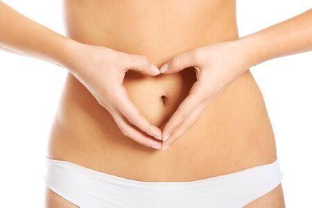 Heart shape on bellyの写真素材