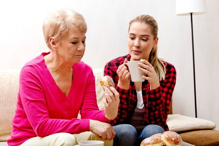 Elderly woman and her daughterの写真素材