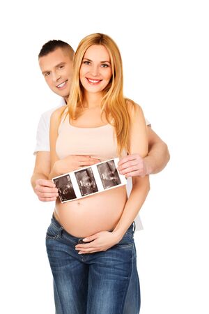 Pregnant couple with usg picturesの写真素材