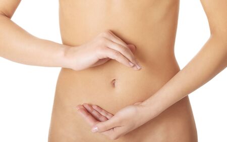 Woman with fit belly, digestionの写真素材