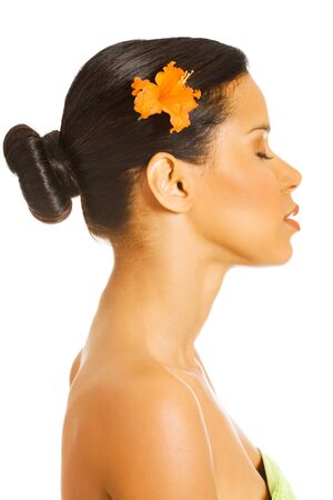 Woman with flower in spa conceptの写真素材