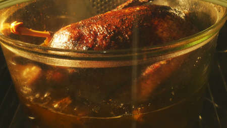 Full goose cooking in roasterの写真素材