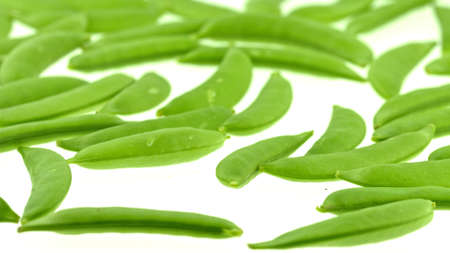 Peas group lying on white background witch goes around. Food for background.の写真素材