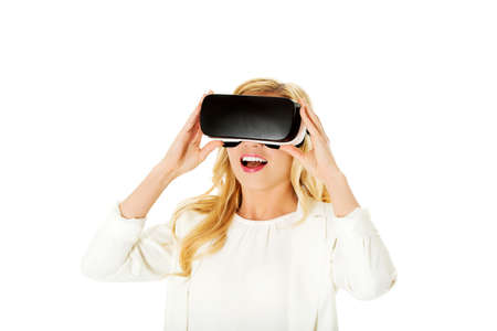 Business woman with VR headset glasses device. Virtual reality concept.の写真素材