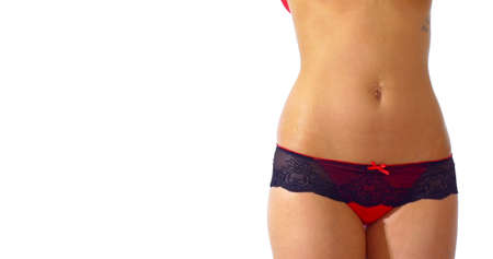 Woman is undressing with her braの写真素材