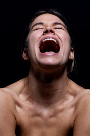 Screaming woman in blackの写真素材
