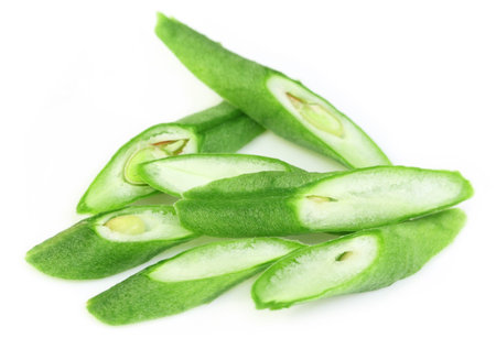 Chopped Yard long bean over white backgroundの写真素材