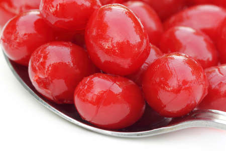 Processed cherry with a silver spoonの写真素材