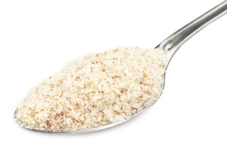 Medicinal Isabgol or psyllium husks on a spoonの写真素材