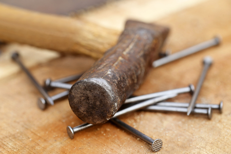 Close up of a Hammer and nailsの写真素材