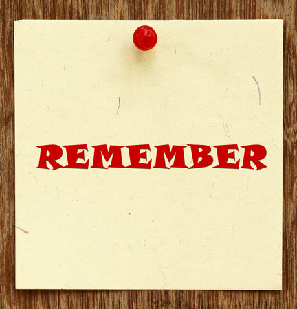 Notice written REMEMBER in a notice boardの写真素材