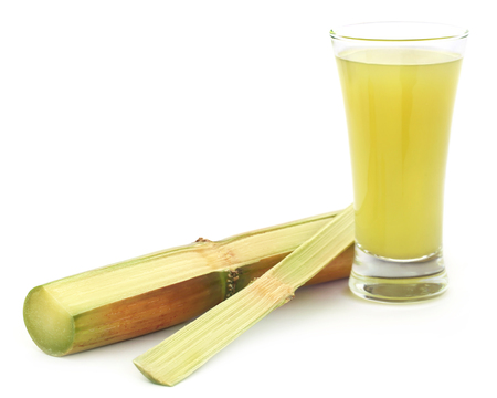 Piece of sugarcane juice in a glassの写真素材
