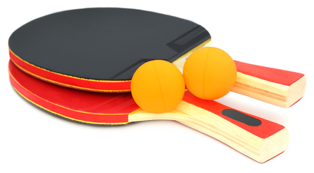 Table tennis bats and ball over white backgroundの写真素材