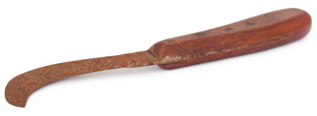 Rusty cutting tool of Bangladesh known as da over white backgroundの写真素材