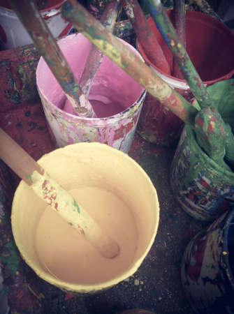 Used Paint brush with different color pots vintage styleの写真素材