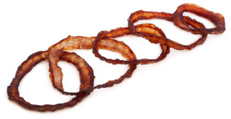 Sliced onion rings over white backgroundの写真素材