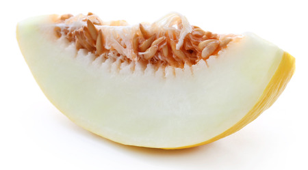 Brilliant honeydew melon over white backgroundの写真素材